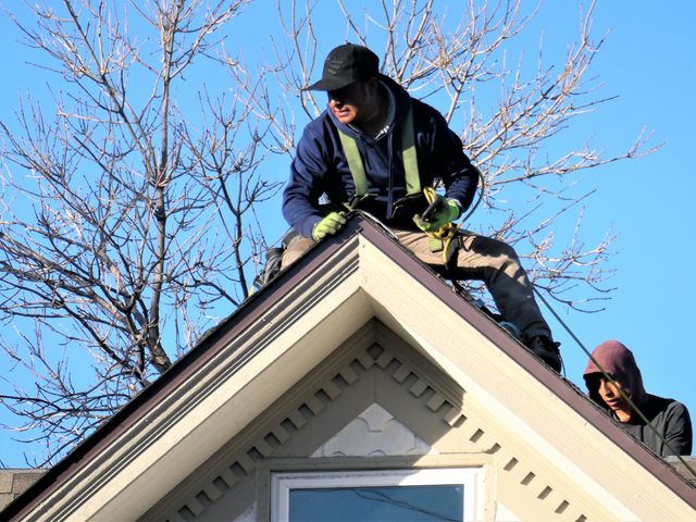 Roofer working on a pitched roof